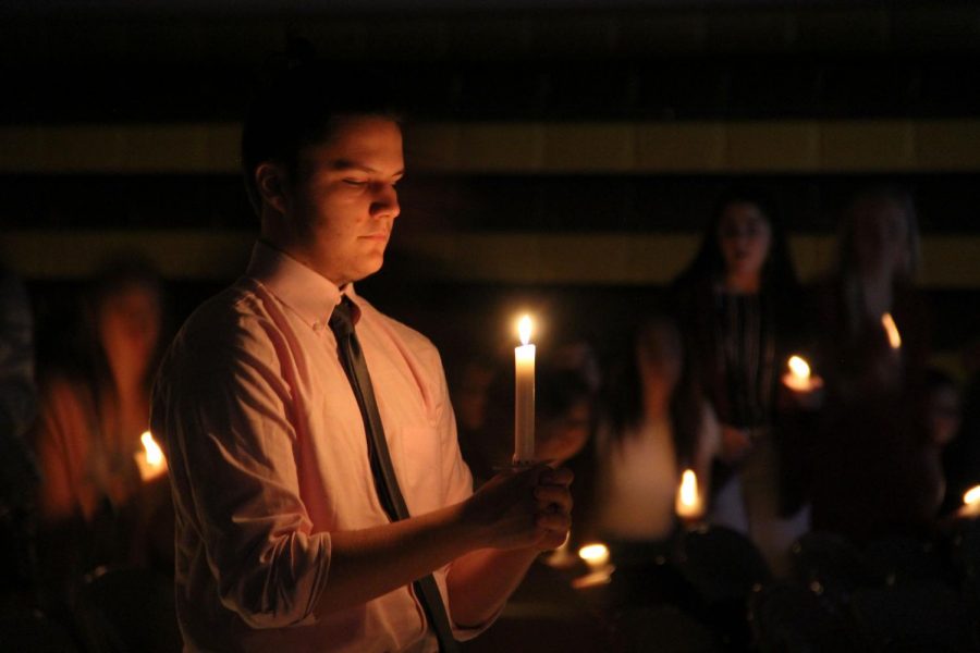 Since 1955 senior members of the National Honor Society have prepared a silent Candle lighting ceremony for the school. This long held tradition has been a memorable experience for those who participate. It was an amazing experience, it was truly an honor to be part of a long lasting Lees Summit High School tradition, senior Harris Childs said. Childs participated in the tradition as an usher to help light candles. 