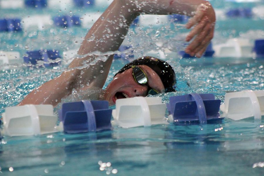 Sophomore Andrew Nelson swims the 500-yard freestyle at Gladstone Community Center on Oct. 1. Swimming a race is exciting. Just the thrill of being in a race, its like nothing else. Ive never experienced anything like it, Nelson said. 
