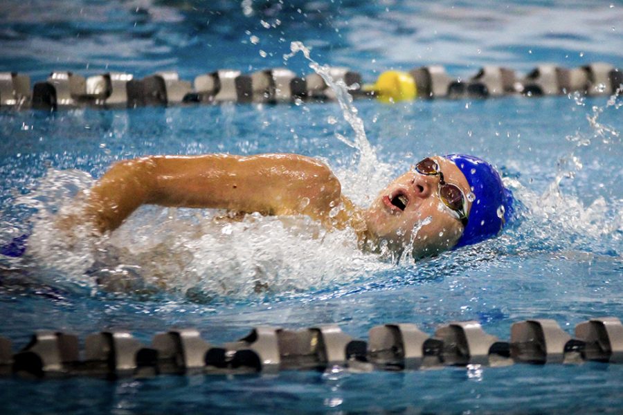 Swimming the 400 freestyle relay, freshman Will Cottle breathes during his race at the St. Peters Rec Plex, Oct. 5. 