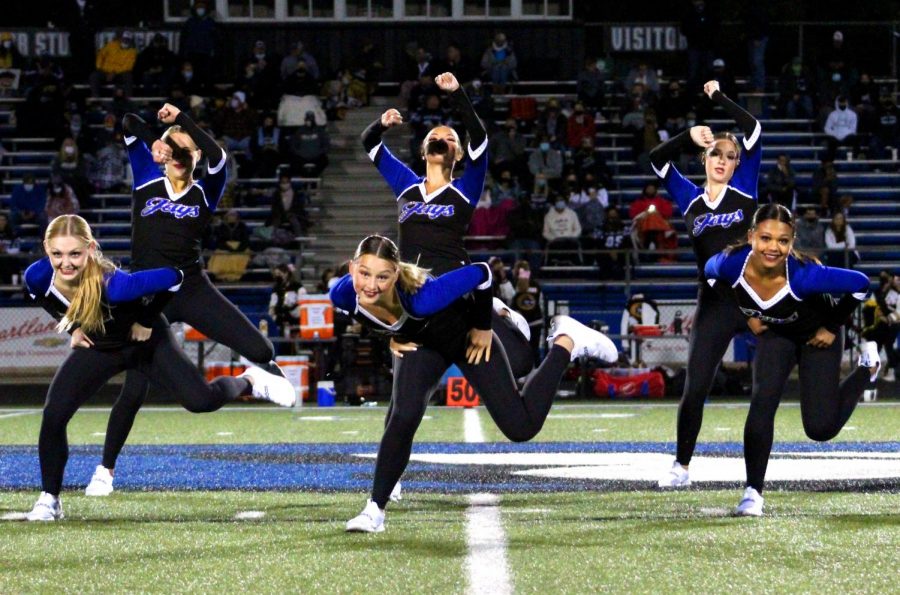 Seniors Keegan Ward, Katie Mackey Juniors Tegan Brown, Kellen Reeve and Sophomores Alana Bryson, Reese McFather perform at the halftime show against Raymore Peculiar on October 16th. This hip hop dance was supposed to be performed at the annual HOCO assembly, but it was cancelled due to COVID-19. "It was very sad to learn the HOCO pep assembly was cancelled, but it was nice to get to show off our work to the crowd," Ward said.
