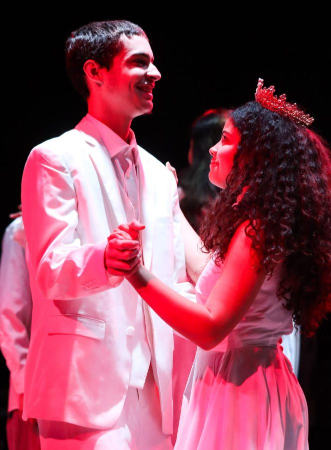 Andrea, played by senior Eliany Urena, waltzes with her love interest, Daniel Beauxhomme, played by senior Noah Croom, in the spring one-act production of Once On This Island. Urena put some pressure on herself for this performance, as she had never performed in a theatre production before. It was my first show and I didnt want to disappoint anyone. I was like, I gotta do this, Urena said.