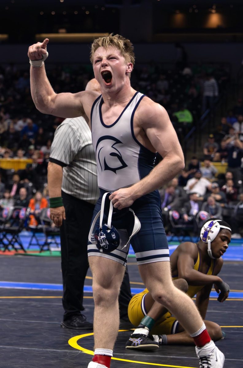 Senior Noah Keen celebrates winning a state title in the 138-pound weight class. Keen was the only male Spartan wrestler to win a title at the Class 4 Missouri championships over the weekend of Feb. 23-24. 