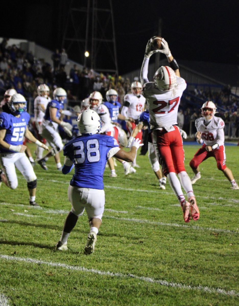 Senior Blaize Vaughn catches a pass right outside the end zone to run it in for a touchdown. “All I was thinking about during this play was how much not just my team but all of Lawson needed me to get into that end zone,” Vaughn said. This was the team’s second-round district game against Brookfield, which they lost 28-14, ending their season with a 5-6 record.