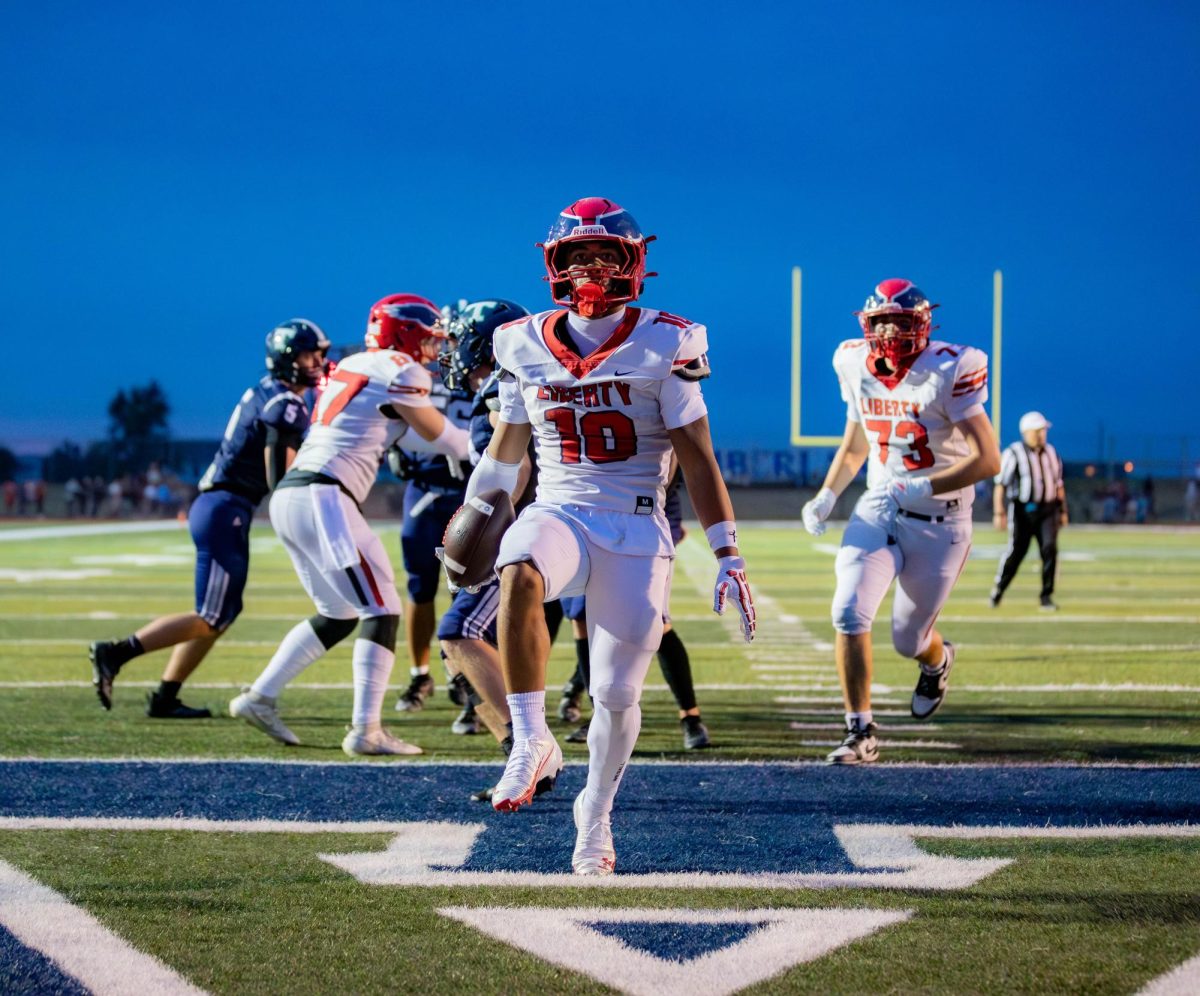 During a close game between Liberty and Timberland on Sept. 5, senior Jaylen Mack (#10) started the game off with a fumble. Mack bounced right back and on the next play scored a 40-yard touchdown. “The touchdown was a little more personal for me because Timberland's head coach was my old head coach freshman year so I felt really excited to just go out there and get two touchdowns off,” Mack said.